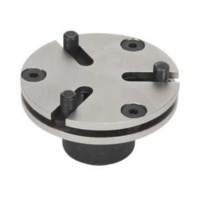 A metal three-jaw chuck with a cylindrical base, featuring adjustable jaws and three screws on the surface, similar to the Sealey Adjustable Brake Wind-Back Adaptor - 3-Pin 3/8"Sq Drive - VS329.