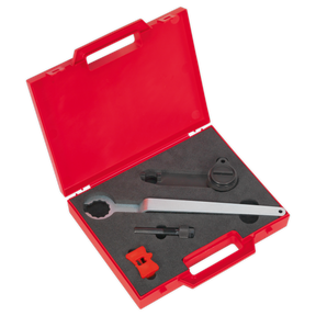 The Sealey Petrol Engine Timing Tool Kit for VAG 1.0 Belt Drive (model VS5140) comes in a robust red plastic case with a black foam interior. The kit includes essential tools such as a spanner, a cylindrical component, and two smaller parts. The cutouts within the case securely hold camshaft sprockets and specialized parts designed specifically for VAG 1.0 petrol engines, ensuring easy access when the case is open.