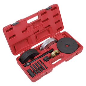 The Sealey Front Wheel Bearing GEN2 Removal/Installation Kit 78mm - VS7030 is a red plastic case containing various automotive tools, including circular metal plates, bolts, and connectors for front wheel bearing replacement, all arranged in designated compartments.