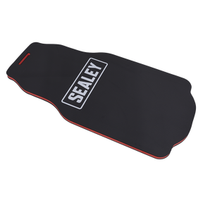 The Sealey Mechanic's Mat EVA - 28mm (VS8590) is a black and red automotive creeper, designed with an ergonomically cushioned EVA mat for mechanics to comfortably work under vehicles on any workshop floor. Its oil and water-resistant properties ensure durability in tough working conditions.