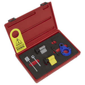 The Sealey Diesel Engine Timing Tool Kit 1.2D/1.4D/1.6D/2.0D - for VAG, Ford & Mitsubishi (model VSE2092) features a red plastic case containing various tool components. These include a yellow warning tag, metal rods, a blue fixture, a yellow and black clamp, and an Allen key—all set in black foam. This timing tool kit is designed specifically for belt drive engines in VAG diesel engines.
