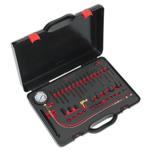 The Sealey Compression Test Kit - Diesel - VSE3158 is a black toolkit case featuring various automotive tools, such as a pressure gauge, hoses, adapters, and connectors, all neatly organized in foam cutouts. It's ideal for working on diesel vehicles and includes dummy glow plugs for precise diagnostics.