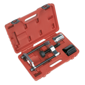 The Sealey Rear Trailing Arm Bush Tool - Ford, Mazda, Volvo - VSE4780 is a red plastic carrying case containing a puller tool and several attachments, perfect for removing rear axle components or servicing rear trailing arm bushes on Ford, Mazda, and Volvo vehicles.