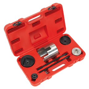 The Sealey Trailing Arm Bush Tool - Vauxhall/Opel - VSE4787 is a red plastic carrying case containing various metal and plastic components, perfect for the removal or installation of toolsets during mechanical assembly or repair tasks on Vauxhall/Opel vehicles.