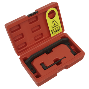 The Sealey Petrol Engine Timing Tool Kit - VSE5092 is a black metal tool housed in an orange plastic case, featuring a yellow warning tag on the handle, meticulously designed for timing belt replacement on 1.0 VTi and 1.2 VTi Pure-Tech engines from PSA, GM, and Toyota.