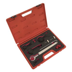 The Sealey Petrol Engine Timing Tool Kit for VAG 1.0/1.2/1.4 TSi - Belt Drive (VSE5760) includes a red plastic case with various hand tools and components, such as camshaft locking devices, all neatly organized in molded foam compartments. The case is open, showcasing the tools inside.