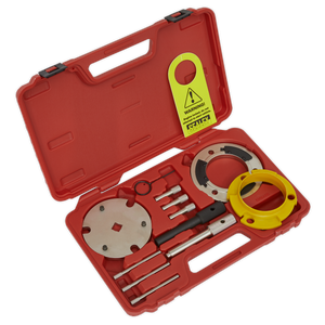 Sealey's Diesel Engine Timing Tool & Injection Pump Tool Kit - 2.0D, 2.2D, 2.4D Duratorq - Chain Drive (VSE5841A) comes in a red plastic case and includes various metal components such as wrenches, adapters, and a bright yellow warning tag—making it ideal for servicing diesel engines and Duratorq engines.