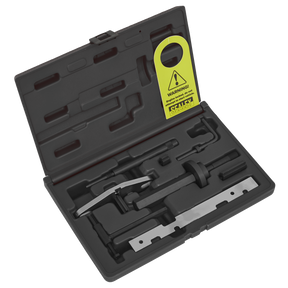 A Sealey Diesel Engine Timing Tool/Timing Chain/Pump Remove-Install Kit (VSE5843), featuring a black plastic case with various compartments for different automotive tools, ideal for timing belt replacement and chain drive diesel engines, and accompanied by a yellow warning tag.