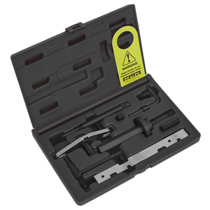 A Sealey Diesel Engine Timing Tool/Timing Chain/Pump Remove-Install Kit (VSE5843), featuring a black plastic case with various compartments for different automotive tools, ideal for timing belt replacement and chain drive diesel engines, and accompanied by a yellow warning tag.