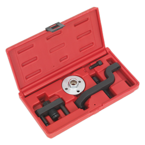 A robust, red plastic case from Sealey containing the Water Pump Removal Kit - VW 2.5D TDi PD - VSE6000, featuring specialized automotive tools including a puller, tensioner, and various attachments specifically designed for diesel engines.