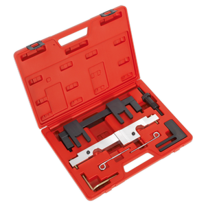 A Sealey Petrol Engine Timing Tool Kit for BMW 1.6/2.0 N43 (Chain Drive) features a red plastic case that holds an assortment of black and metallic camshaft tools, all meticulously arranged within fitted compartments.