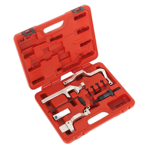 The Sealey Petrol Engine Timing Tool Kit - VSE6131, ideal for maintaining your BMW Mini, Citroen, or Peugeot with chain drive systems, comes in a red plastic case and includes a variety of metal tools such as wrenches for all your automotive maintenance needs.