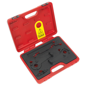 The Sealey Petrol Engine Timing Tool Kit - Audi 4.2 V8 - Chain Drive (VSE7407) comes in a red plastic carrying case that organizes the included black tools, such as the wrench and other specific components. The interior is molded to securely fit each tool, including camshaft setting plates and a crankshaft locking pin. A yellow caution label is prominently displayed inside.