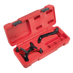 The Sealey Universal Twin Camshaft Locking Tool - VSE888 comes in a red plastic carrying case and includes a black puller tool with adjustable arms, making it perfect for mechanical use on twin camshaft diesel engines.