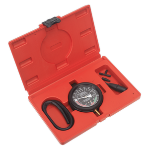 The Sealey Vacuum & Fuel Pump Pressure Test Gauge Set - VSE952 is a red plastic case containing an Ø80mm gauge, a rubber hose, and various small attachments for identifying fuel line leaks.