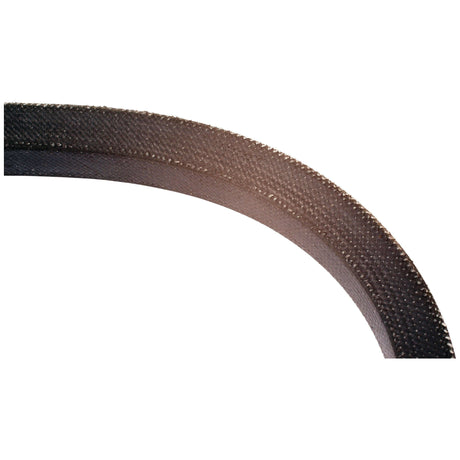 A close-up of a curved section of a textured, dark-colored material with a woven fabric edge and light reflecting off the surface showcases an intricate design reminiscent of the V Belt - A Section - Belt No. A26 by Sparex (Part No. S.18708), highlighting both its durability and craftsmanship.