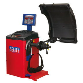 A Sealey Wheel Balancer - Semi-Automatic - WB10 with a digital control panel, featuring auto data input and a protective cover attached, in red and black.