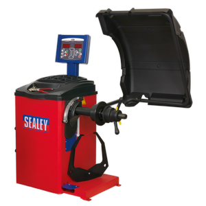 A Sealey Wheel Balancer - Semi-Automatic - WB10 with a digital control panel, featuring auto data input and a protective cover attached, in red and black.