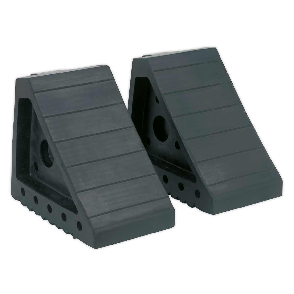 The Sealey Rubber Wheel Chocks - Pair - WC01 are two black rubber chocks designed to prevent vehicle movement. They feature a grooved surface and side holes for securing, making them perfect for ensuring vehicle incline safety.