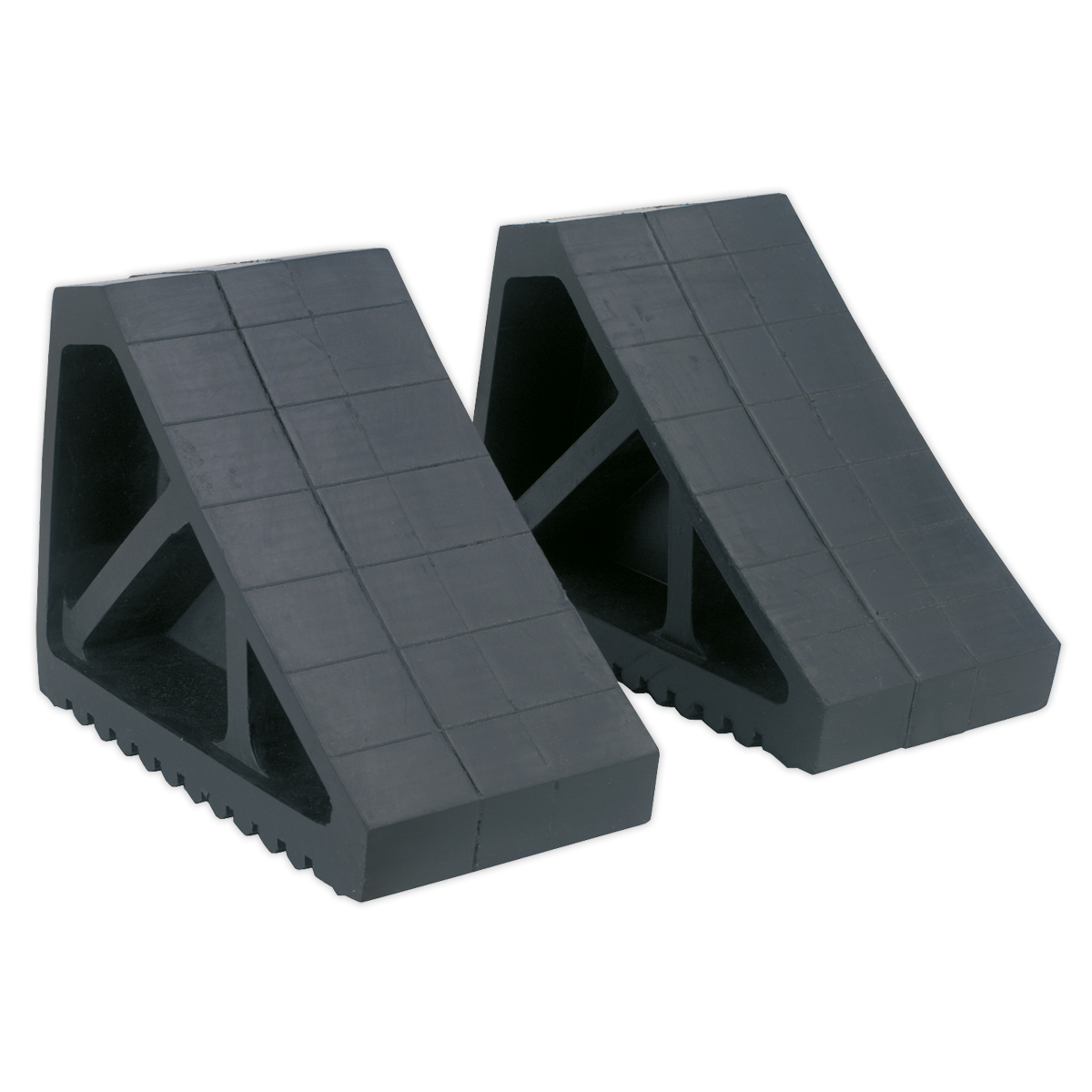 Two Sealey Rubber Wheel Chocks - Pair - WC02, featuring a black rubber construction with a grid pattern on the surface, designed to prevent vehicle movement when jacked on a level surface.