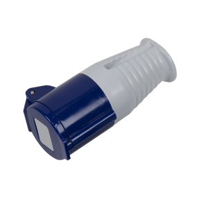 The Blue Socket 230V/16A - WC24016 by Sealey is an electrical connector plug, featuring 2P+E connectors for added reliability and a ribbed handle, shown lying on its side.