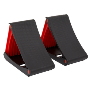 Two black and red Sealey Folding Wheel Chocks - Pair - WCF01, designed for ergonomic support, shown in an open position, perfect for compact storage during an emergency wheel change.