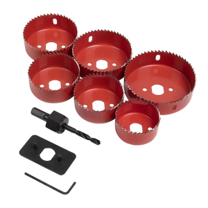 The Downlight Hole Saw Kit 9pc - WDLK by Sealey includes six red hole saws of varying sizes, an arbor with a pilot drive, a black hex key, and a black tool plate, all arranged on a white background—ideal for cutting out spaces for downlights.