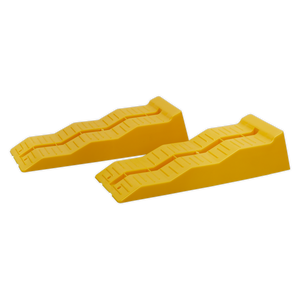 Two yellow Levelling Ramps from Sealey, each with a 3-stage sloped design and ridged surfaces, made from UV-resistant high-density polyethylene. Ideal for securing campervans and caravans, these ramps boast a combined 5-tonne capacity per pair.