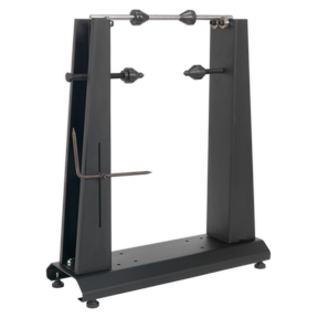 Sealey's WTS01 Motorcycle & Bicycle Wheel Balancer & Truing Stand features a sturdy black base with adjustable arms, designed to hold multiple wheels in place. It achieves precise alignment akin to professional truing stands, ensuring your wheels are securely balanced and trued.