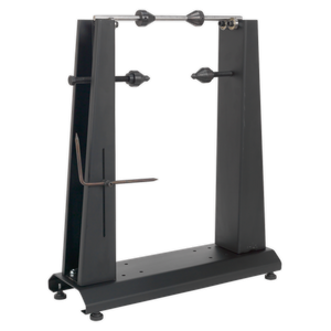 Sealey's WTS01 Motorcycle & Bicycle Wheel Balancer & Truing Stand features a sturdy black base with adjustable arms, designed to hold multiple wheels in place. It achieves precise alignment akin to professional truing stands, ensuring your wheels are securely balanced and trued.