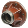 The Sparex Wheel Hub (Part No. S.40245) by Sparex is rust-colored with circular holes around its edge, designed for mechanical use, and perfect for models like the Massey Ferguson 135.