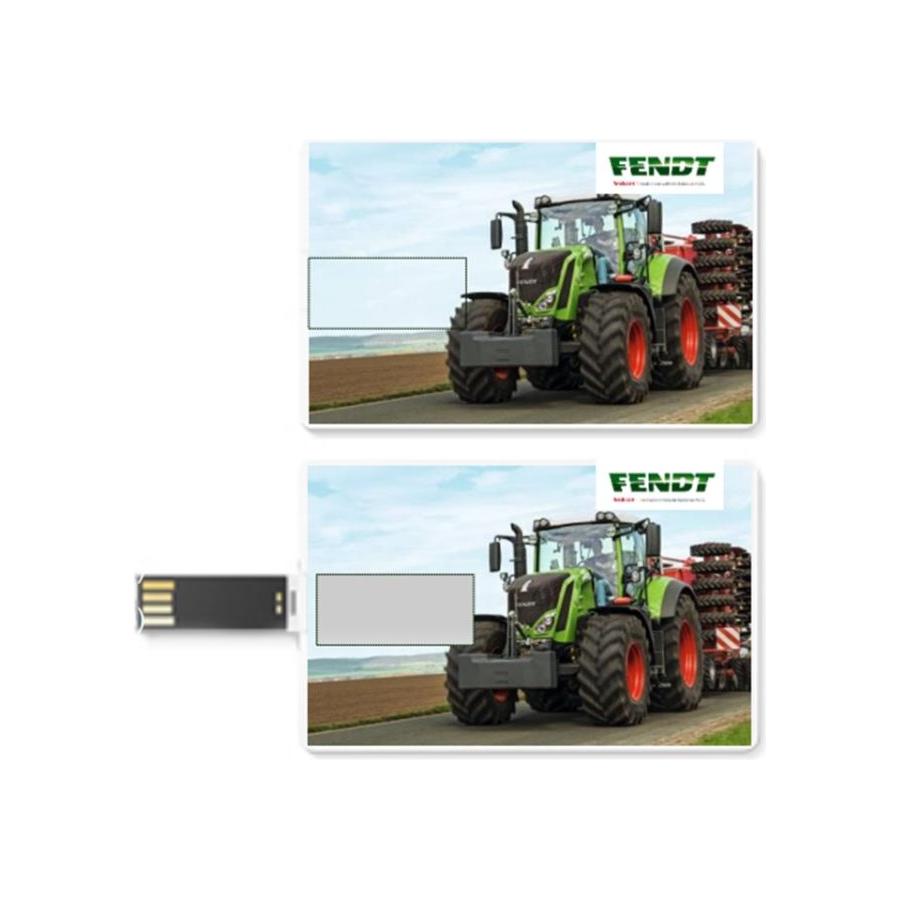 Two USB Card flash drives designed to resemble cards display an image of a green Fendt 800 Vario tractor on a road. The top drive is closed, while the 4 GB Flash Drive at the bottom is open, showcasing its USB connector. This product is named "Fendt - USB Card: Fendt 800 Vario - X991021119000" and is branded by AGCO.