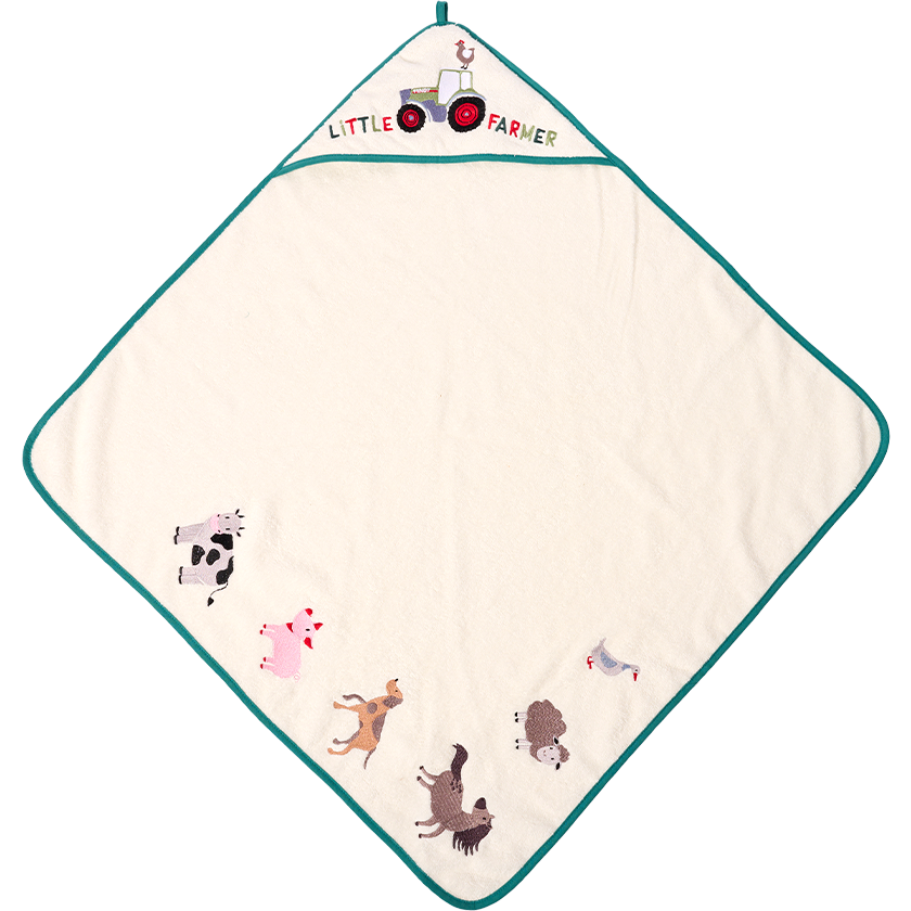 The AGCO Fendt baby bath towel, model number X991023170000, is a white soft cotton terry cloth towel with green trim. It features embroidered farm animals in one corner and the text "LITTLE FARMER" along with a tractor in another corner.