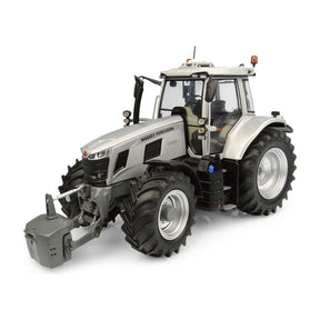 A limited edition silver and white AGCO MF 7S.210 tractor with black tires and a front attachment, shown from an angled front view, model number X993042306618 in 1:32 scale.