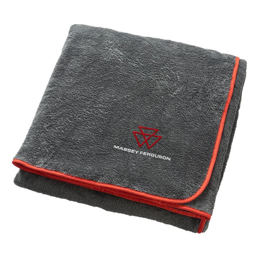 A folded AGCO Massey Ferguson - New Logo Blanket (X993412005000) in grey fleece-feel with red trim and the Massey-Ferguson logo embroidered on it.