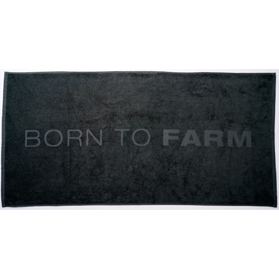 Introducing the Massey Ferguson Bath Towel - Born To Farm (X993582301000) by AGCO, a dark green rectangular terry cloth towel featuring the bold statement "BORN TO FARM" printed prominently in large, capital letters across the center.