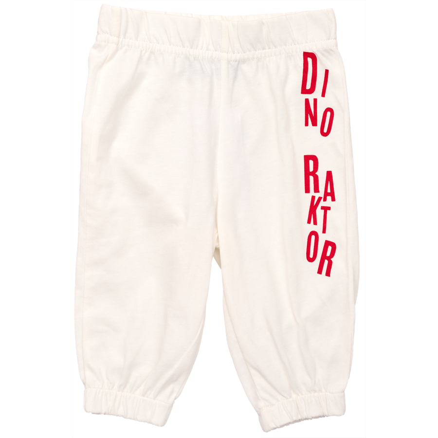 White elastic-waist pants from AGCO's Massey Ferguson Baby Dino Raktor collection, featuring red vertical "DRINKATOR" lettering on the right leg (Product Code: X993602303100).