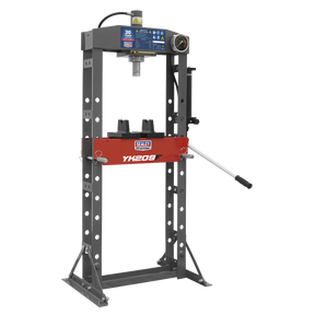 The Sealey Hydraulic Press 20 Tonne Floor Type, labeled "YK209F," features a red base, a pressure gauge, and a long operating handle on the right side. It also boasts a heavy-duty steel frame for added durability.