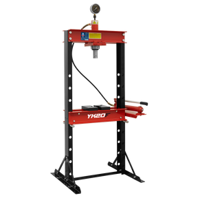 A red and black Sealey hydraulic press machine, model YK20F, with a pressure gauge on top, a lever on the right side, and a sliding hydraulic ram. Featuring steel frame construction and boasting 20 tonnes of pressing power.