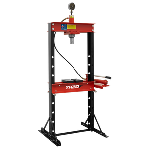 A red and black Sealey hydraulic press machine, model YK20F, with a pressure gauge on top, a lever on the right side, and a sliding hydraulic ram. Featuring steel frame construction and boasting 20 tonnes of pressing power.