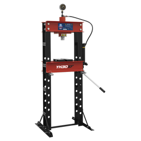 The *Sealey Hydraulic Press 30 Tonne Floor Type - YK30XF* features a red and black design with a ram pressure gauge on top and a lever on the side. Its steel frame construction is supported by perforated metal legs, and the model number YK30XF is prominently displayed on the central red part.