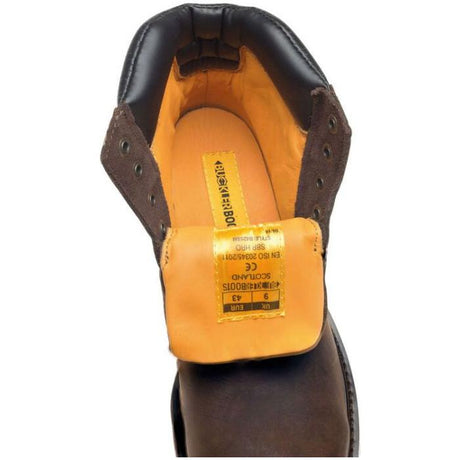 Close-up of a brown *SPECIAL PRICE* - Buckler - Lace Safety Boot - B425Sm by JMCE, showing the yellow and orange interior, and a label with size information on the inside of the tongue.