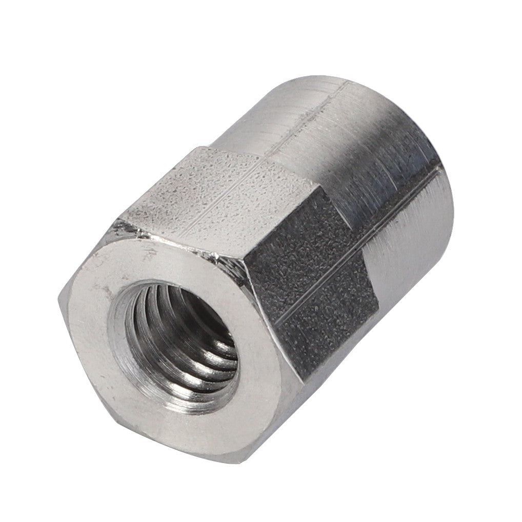 Close-up of the AGCO | Sleeve Nut - Acp0665080, a hexagonal steel coupling nut with a threaded interior, ideal for connecting two threaded rods or bolts. Note: No current product description available for further details.