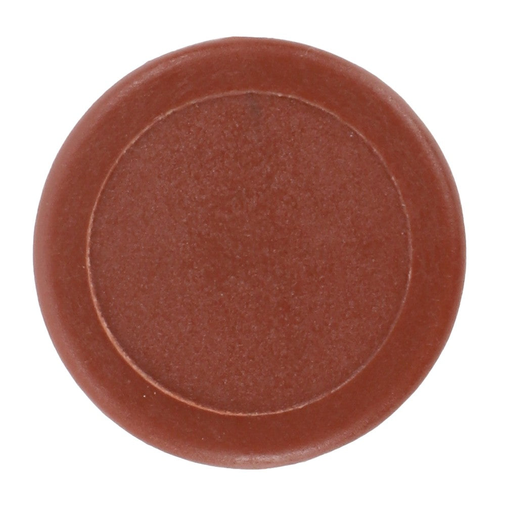 A top-down view of the AGCO | Cap - Acp0671450, a round, brown disc-shaped object on a white background. No current product description available for this product.