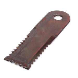 Rusty serrated metal tool with a flat, rectangular shape and a circular hole at one end, resembling the AGCO Straw Chopper Rotor Knife - D49062900.