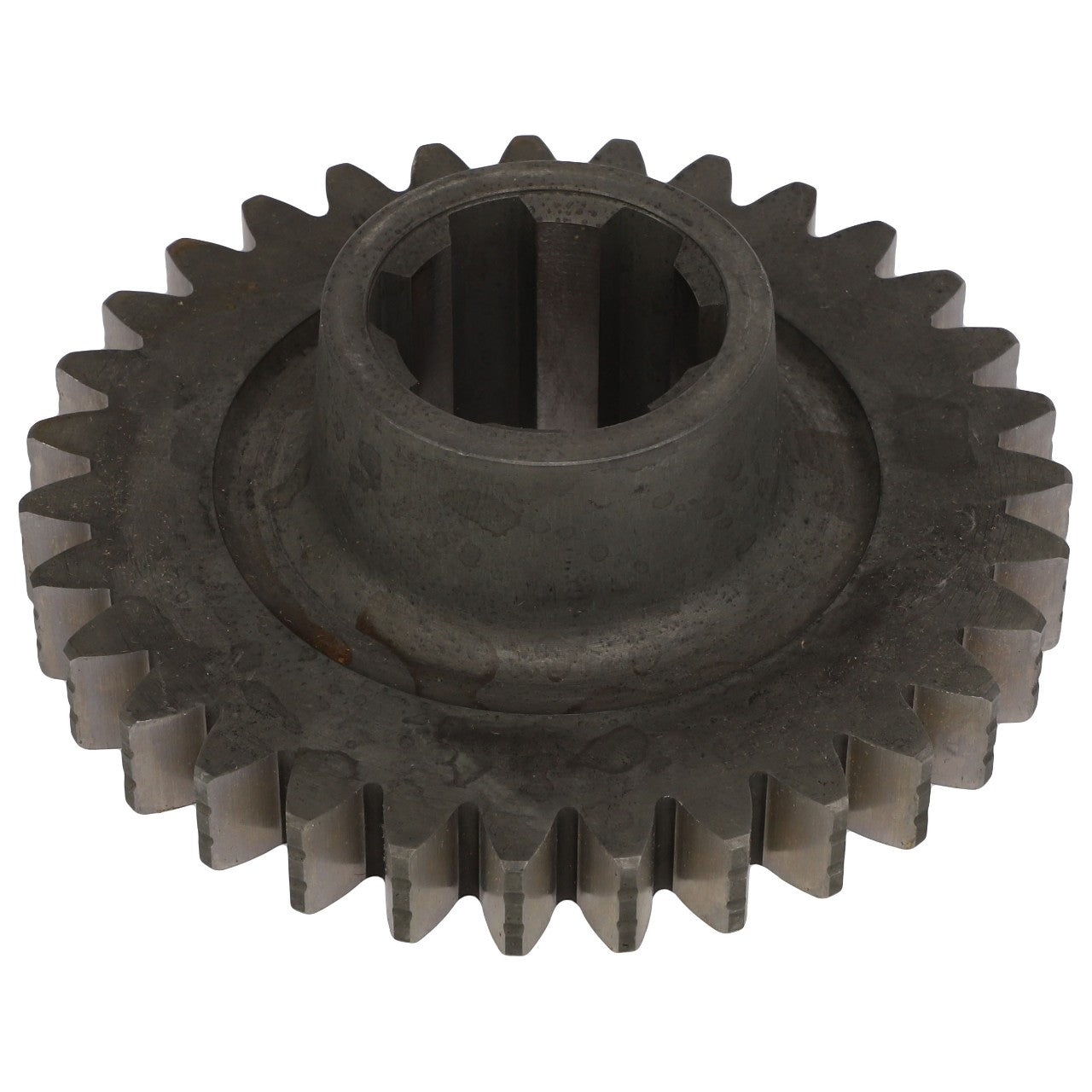 The AGCO Pinion - 3599417M1 is a metal gear with a circular shape and evenly spaced teeth around its edge, perfect for various Massey Ferguson models. The center features a hollow cylindrical opening.