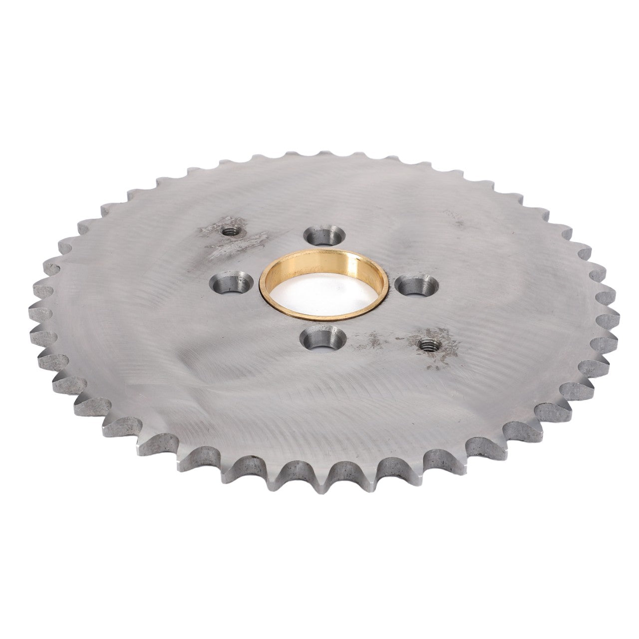 The AGCO Gear Cutting Table Drive Transmission - La300115357 is a silver metal sprocket with evenly spaced teeth around the edge, featuring a central golden bushing and four smaller holes surrounding the center. This genuine AGCO Parts component ensures your machinery runs smoothly and efficiently.