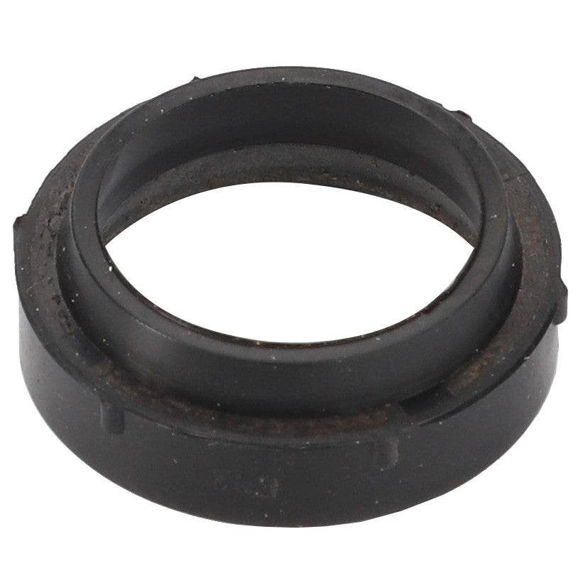 The AGCO | Seal - Acp0580430 by AGCO is a black, circular rubber gasket featuring a central hole and a slightly raised outer edge. No current product description available.