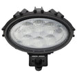 A black, oval-shaped AGCO worklight (model Acw5176070) with a ribbed glass lens and mounting bracket, compatible with various Massey Ferguson models.