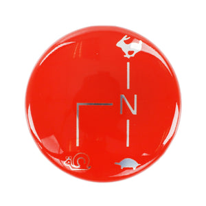 The AGCO Badge (Acp0668860) features a red circular dial with three symbols that represent different speed levels: a rabbit at the top, a turtle at the bottom right, and a snail at the bottom left. Note: There is currently no detailed product description available.